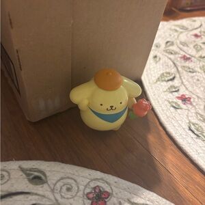 Cute Yellow Figurine with Orange Hat